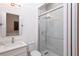Bright bathroom featuring a glass shower door and modern vanity at 1841 Moorings Ct, Clermont, FL 34711