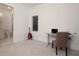 Bedroom with guitar, desk, and ensuite bathroom at 1841 Moorings Ct, Clermont, FL 34711