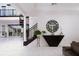 Welcoming foyer with staircase, modern decor, and open floor plan at 1841 Moorings Ct, Clermont, FL 34711