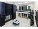 Open floor plan with kitchen and dining area, modern decor and lighting at 1841 Moorings Ct, Clermont, FL 34711