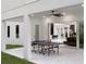 Covered patio featuring a ping pong table and open access to the home's interior, perfect for entertaining at 1841 Moorings Ct, Clermont, FL 34711
