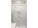 Close-up of a pristine shower featuring a rain shower head and sleek, modern tiling at 1841 Moorings Ct, Clermont, FL 34711