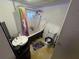 Unique bathroom featuring a clawfoot tub, pedestal sink, and classic fixtures at 721 Crestview Dr, Casselberry, FL 32707
