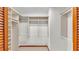 Walk-in closet with custom shelving for optimal organization at 4120 Chelsea Ln, Lakeland, FL 33809
