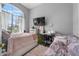 Shared bedroom featuring two beds, a large window and a modern desk, ideal for students at 4013 Greystone Dr, Clermont, FL 34711