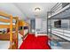 Fun bedroom with multiple bunk beds, perfect for , and a TV for entertainment at 4013 Greystone Dr, Clermont, FL 34711