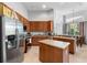 Kitchen with stainless steel refrigerator and a center island at 4013 Greystone Dr, Clermont, FL 34711