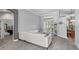 Spacious living area with a comfortable sectional sofa, neutral color palette, and plenty of light at 4013 Greystone Dr, Clermont, FL 34711