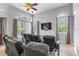 Home theater living room featuring leather seating at 4013 Greystone Dr, Clermont, FL 34711