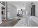 Open-concept living space featuring high ceilings, dining room views, and a plush sectional sofa at 4013 Greystone Dr, Clermont, FL 34711