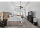 Main bedroom with a high ceiling and views to the outside at 4013 Greystone Dr, Clermont, FL 34711