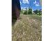 Backyard featuring a spacious lawn perfect for outdoor activities at 507 Cloudcroft Dr, Deltona, FL 32738