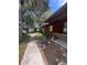 A single-story home featuring a small porch and colorful landscaping at 507 Cloudcroft Dr, Deltona, FL 32738