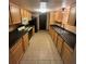 Efficient kitchen layout with ample counter space, lots of storage, and modern appliances at 507 Cloudcroft Dr, Deltona, FL 32738