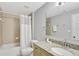 Bathroom featuring granite vanity, shower with curtain, bathtub, and tile flooring at 8601 Worldquest Blvd # 3404, Orlando, FL 32821