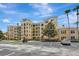 Beautiful condo complex featuring well-maintained landscaping, convenient parking, and an inviting entrance at 8601 Worldquest Blvd # 3404, Orlando, FL 32821
