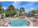 Relaxing hot tub area surrounded by lush greenery and lounge seating at 8601 Worldquest Blvd # 3404, Orlando, FL 32821