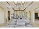 Spacious lobby features high ceilings, a chandelier, comfortable seating, and ample natural light at 8601 Worldquest Blvd # 3404, Orlando, FL 32821