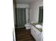 Bathroom with tub and shower combination and vanity with sink at 888 W Stuart St, Bartow, FL 33830