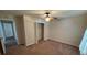 Bedroom with carpet flooring, closet and neutral paint at 888 W Stuart St, Bartow, FL 33830