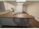 Open kitchen with a breakfast bar, ample counter space, and modern appliances at 888 W Stuart St, Bartow, FL 33830