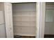 Pantry with multiple shelves and view of the back door at 888 W Stuart St, Bartow, FL 33830