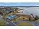 Community featuring waterfront views, tennis courts, a playground, and scenic surroundings for an active lifestyle at 17426 Tailfeather Ct, Clermont, FL 34711