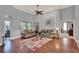 Spacious living room featuring hardwood floors and neutral paint at 17426 Tailfeather Ct, Clermont, FL 34711