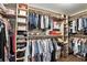 Walk-in closet that features ample space for storage, hanging clothes, and shelves at 1485 Waukon Cir, Casselberry, FL 32707