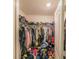 Walk-in closet provides ample storage with shelving and hanging space at 938 Mansfield Rd, Tavares, FL 32778
