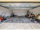 Spacious garage with ample storage space, providing convenient parking and room for hobbies at 938 Mansfield Rd, Tavares, FL 32778