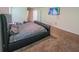 Main bedroom with carpet, natural light, and ample space for relaxation and comfort at 938 Mansfield Rd, Tavares, FL 32778