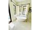 Bathroom filled with natural light with soaking tub and large windows at 1234 W Ivanhoe Blvd, Orlando, FL 32804