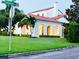 Beautiful home with a tile roof, lush landscaping, and a brick street in a desirable neighborhood at 1234 W Ivanhoe Blvd, Orlando, FL 32804