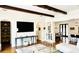 Spacious open-concept area with hardwood floors, modern lighting, and seamless transition to the dining area at 1234 W Ivanhoe Blvd, Orlando, FL 32804