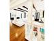 Open living space with hardwood floors, beamed ceilings, built-in cabinet, and seamless transition to living spaces at 1234 W Ivanhoe Blvd, Orlando, FL 32804