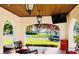 Inviting outdoor patio with ceiling fans and a cozy seating arrangement at 1234 W Ivanhoe Blvd, Orlando, FL 32804
