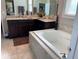 Bathroom features a soaking tub, double vanity, and plenty of natural light at 1446 Vivaldi Pl, Longwood, FL 32779