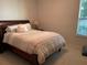 Bedroom with large bed, and natural light from the window at 1446 Vivaldi Pl, Longwood, FL 32779