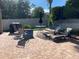 Outdoor patio with seating, grill, and lush landscaping at 1446 Vivaldi Pl, Longwood, FL 32779
