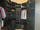 Walk-in closet with shelving, rods and shoe rack at 1446 Vivaldi Pl, Longwood, FL 32779