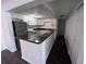Updated kitchen featuring stainless steel appliances, ample counter space, and modern finishes at 4395 E Michigan St # 4395, Orlando, FL 32812
