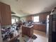 A spacious kitchen with an island and breakfast nook at 2921 Blackburn Ave, Deltona, FL 32738