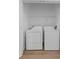 Laundry closet featuring newer model washer and dryer units, and shelving at 584 Brantley Terrace Way # 200, Altamonte Springs, FL 32714