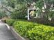 Entrance to Branch Tree featuring an attractive sign amid lush landscaping and trees at 1980 Water Ln, Maitland, FL 32751