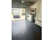 Attached garage featuring a laundry area with new appliances and parking space for a car at 1980 Water Ln, Maitland, FL 32751