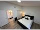 Inviting bedroom featuring an en-suite bathroom and a spacious closet for ample storage at 1980 Water Ln, Maitland, FL 32751