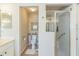 Functional bathroom featuring a walk-in shower and toilet at 2000 Farmington Ct, Clermont, FL 34711