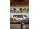 Modern living room with a fireplace and scenic artwork for a comfortable space at 13450 E Lake Mary Jane Rd, Orlando, FL 32832