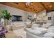 Spacious living room with an open layout, marble floors, and modern decor at 13450 E Lake Mary Jane Rd, Orlando, FL 32832